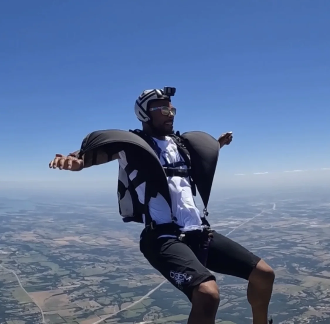 Skeleton Camera Jacket wings open in freefall